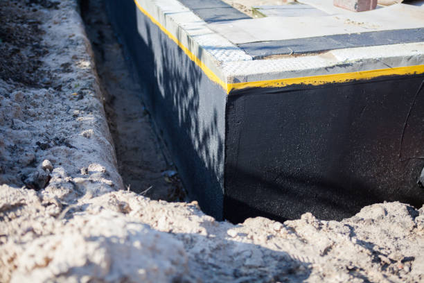 Professional Basement Waterproofing technician working in Mount Victory, OH